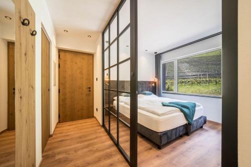 Ένα ή περισσότερα κρεβάτια σε δωμάτιο στο Thanhammer Apt Kreuth