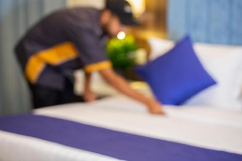 Postel nebo postele na pokoji v ubytování فندق فاندال Vandal Hotel