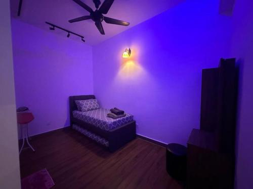 Postel nebo postele na pokoji v ubytování Homestay Troika Kota bharu