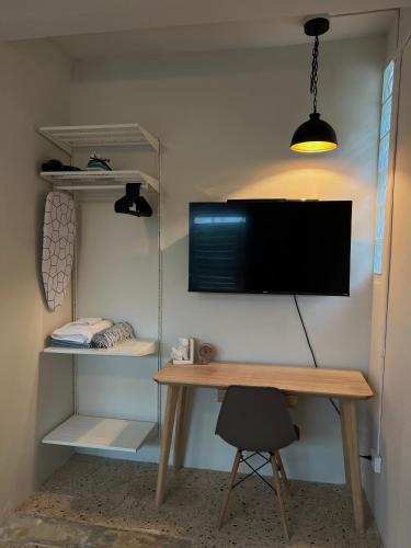 TV a/nebo společenská místnost v ubytování Casa Cecilia PR
