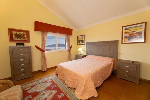 Postel nebo postele na pokoji v ubytování Casa Vila do mar