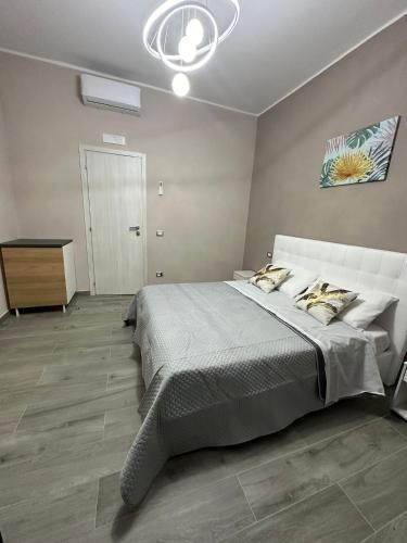 a bedroom with a large bed in a room at B&B Mageva Luxury Room in Naples