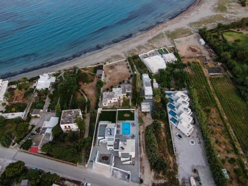 an aerial view of a resort near the ocean at Sea and sun in Kalamitsa