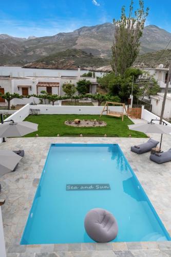 a swimming pool at or near hotel villa margarita at Sea and sun in Kalamitsa