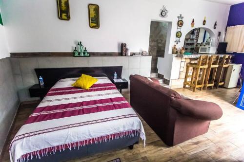 Postel nebo postele na pokoji v ubytování Tiny house Comulco con aire acondicionado.
