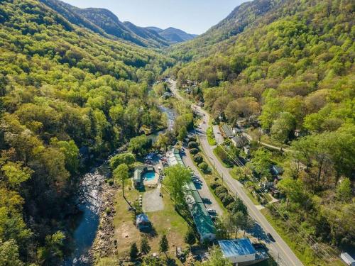 an aerial view of a river in a valley at Geneva Hotel & Tiki Bar in Lake Lure