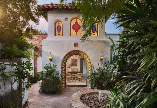 a home with a church with a stained glass window at Lucille Palm Springs in Palm Springs