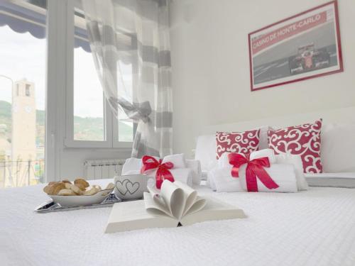 Ένα ή περισσότερα κρεβάτια σε δωμάτιο στο Liguria Home 4 - Recco centro a 2 minuti dal mare