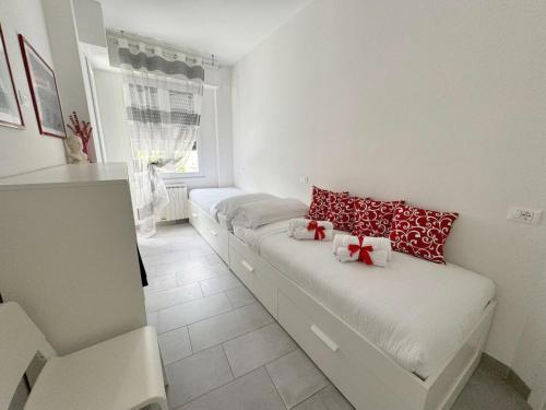 Ένα ή περισσότερα κρεβάτια σε δωμάτιο στο Liguria Home 4 - Recco centro a 2 minuti dal mare