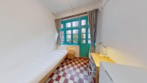 Ένα ή περισσότερα κρεβάτια σε δωμάτιο στο Habyt Bridges - 6-8 Wa In Fong Street
