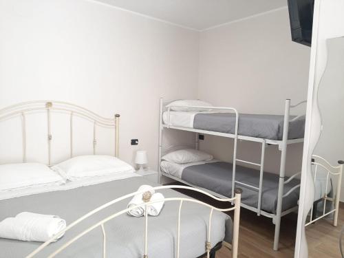 Postel nebo postele na pokoji v ubytování Doria House