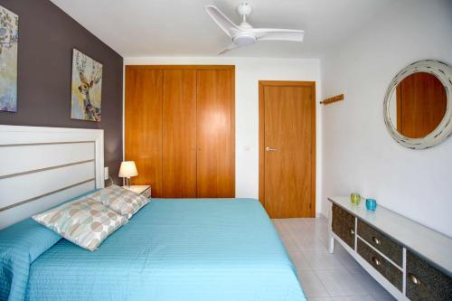Ένα ή περισσότερα κρεβάτια σε δωμάτιο στο Apartamento BellaMar Grau-Playa Gandia