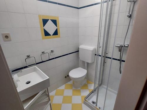 Ein Badezimmer in der Unterkunft Apartaments Victoria