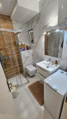 Ванна кімната в Apartment Dalmatino-Lion