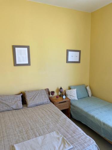 Ένα ή περισσότερα κρεβάτια σε δωμάτιο στο Appartement sable d’or