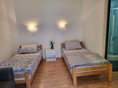 Postel nebo postele na pokoji v ubytování Studio Janko