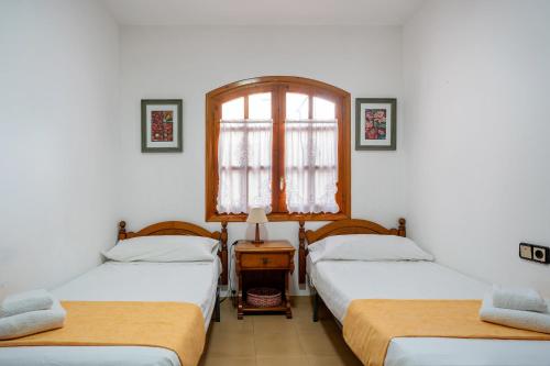 Postel nebo postele na pokoji v ubytování Dúplex con encanto