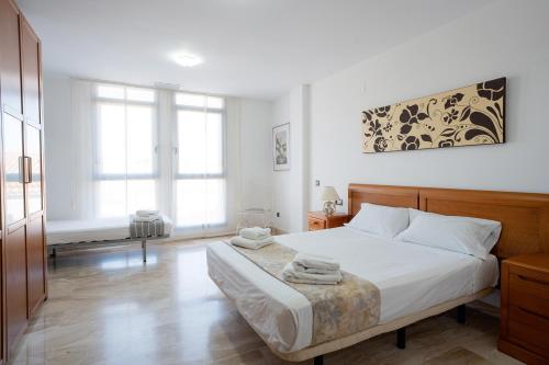 Posteľ alebo postele v izbe v ubytovaní Apartamento Pepi