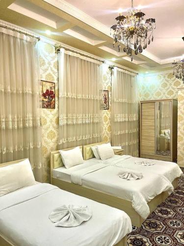 Ліжко або ліжка в номері Elite Hotel