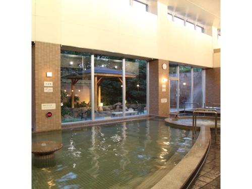 Kyoto Eminence - Vacation STAY 01909v tesisinde veya buraya yakın yüzme havuzu
