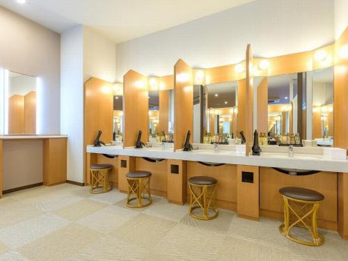 a bathroom with two sinks and two bar stools at Kyoto Eminence - Vacation STAY 01909v in Kyoto