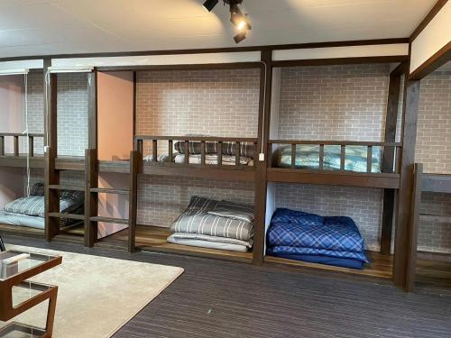 a room with glass shelves with pillows in it at Kojinjuku - Vacation STAY 46728v in Setouchi