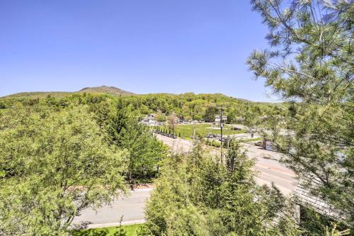 an aerial view of a parking lot with trees at Lillys Mountain Escape in Banner Elk