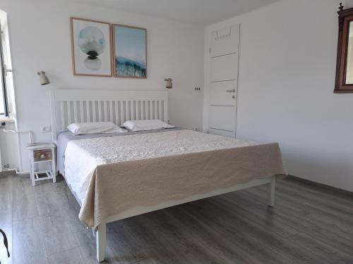 Voodi või voodid majutusasutuse Apartments & Rooms Dinko toas