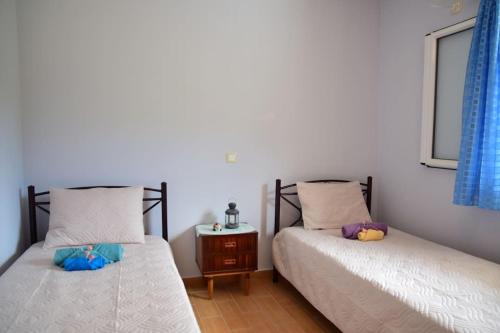 Ένα ή περισσότερα κρεβάτια σε δωμάτιο στο Effie's Escape Spacious country house