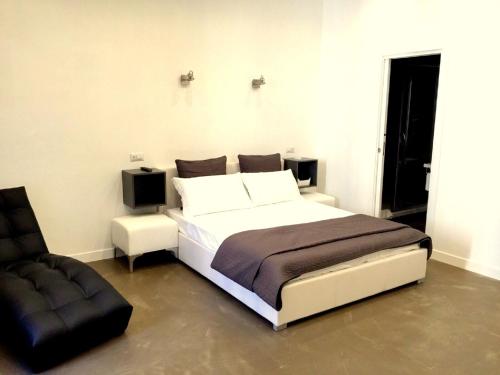 Cama o camas de una habitación en I LOVE ROMA Guest House