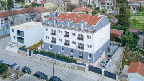 an aerial view of a white building with a red roof at Villa Grace in Rovinj