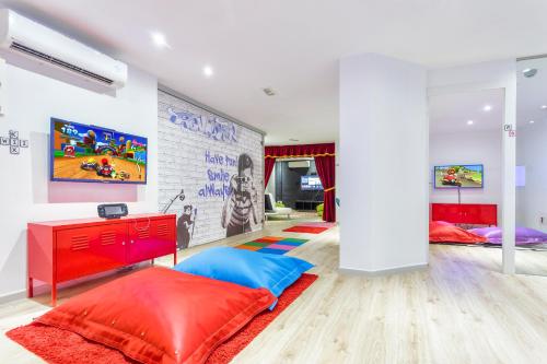 Postel nebo postele na pokoji v ubytování FERGUS Style Cala Blanca Suites