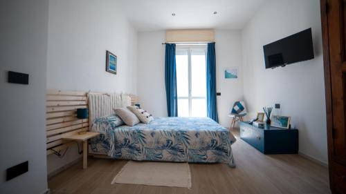 Postel nebo postele na pokoji v ubytování Casa Ri Mimmina