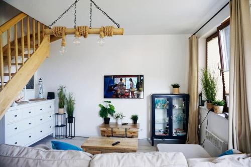 Postel nebo postele na pokoji v ubytování Apartament 12