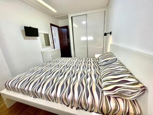 Ein Bett oder Betten in einem Zimmer der Unterkunft Résidence SARY'S-اقامة ساريس