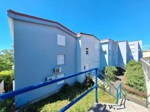 a view of a building from a balcony at Apartment Selce in Selce