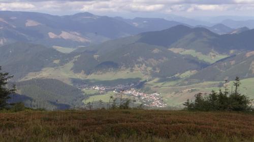 a view of a valley in the mountains at Penzión Baltazár in Liptovská Lúžna