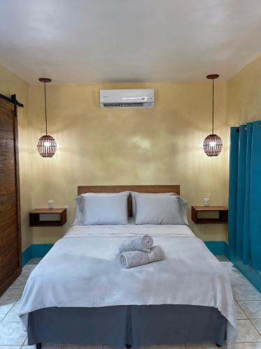 Ένα ή περισσότερα κρεβάτια σε δωμάτιο στο Apartments at Los Delfines