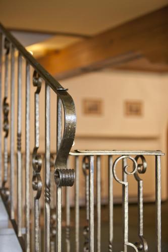a stair railing with water on it at Hotel Untersberg in Sankt Leonhard