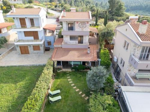an aerial view of a house with a yard at Lilian Luxury Villa Halkidiki in Nea Fokea