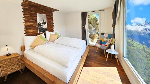 Letto o letti in una camera di Mattertal Lodge