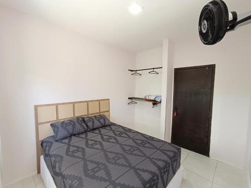 Postel nebo postele na pokoji v ubytování Quarto Privado Confortável em Pontal do Sul