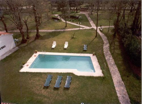 Bazén v ubytování Hotel San Vicente nebo v jeho okolí