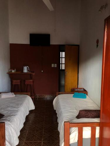 Säng eller sängar i ett rum på Alquiler por día zona ideal Posadas, Misiones