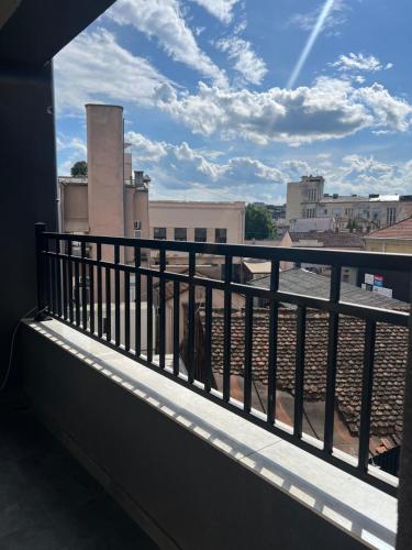 a balcony with a view of a factory at MSCondoApartment in Kragujevac