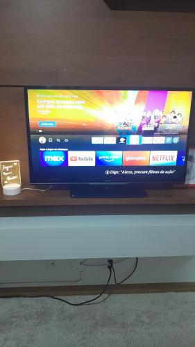 TV a/nebo společenská místnost v ubytování Apartamento Viracopos Campinas