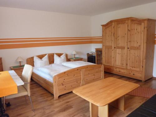 Postel nebo postele na pokoji v ubytování Hotel Oranien