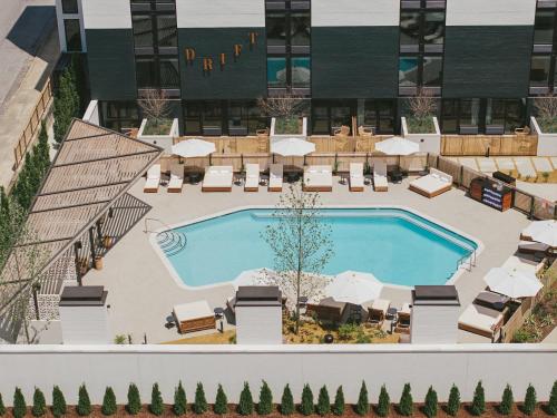 an overhead view of a pool at a hotel at Drift Nashville, a Member of Design Hotels in Nashville