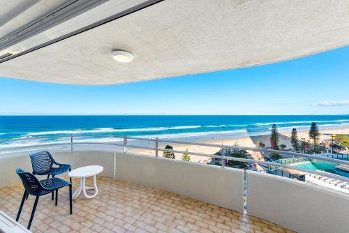 a balcony with a view of the beach and the ocean at Zenith Ocean Front Apartments Gold Coast - Official Listing in Gold Coast