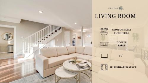a living room with a couch and a table at Elegant 5BR 2,5BA Holiday Home with Pool, Jacuzzi, BBQ, and Cinema Room in Farmers Branch